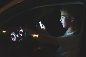 Teenager distracted driving while texting