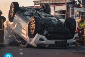 car upside down after accident in road