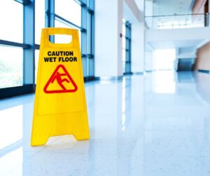 Caution wet floor sign on recently mopped floors.