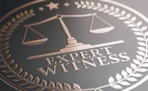 expert witness legal symbol 3D illustration embossed on iron background in bronze