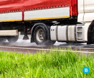 worn or under-inflated tires are a major cause of semi-truck hydroplaning accidents
