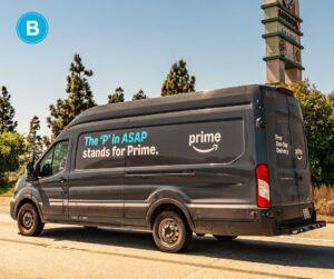 An Amazon delivery truck speeds down the highway