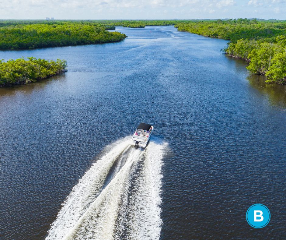 A boat travels along a lake waterway in Florida.