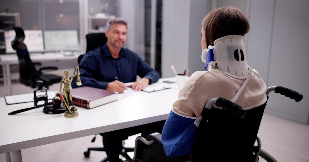 Injured woman meets with attorney to discuss who she can sue for a delivery truck accident.